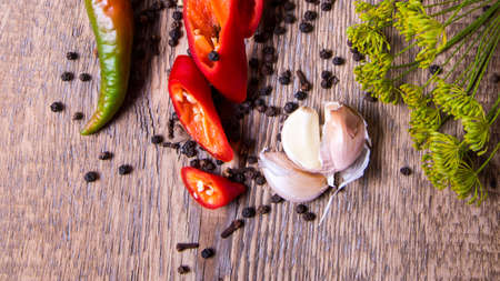 Hot hot green red pepper sliced and whole with dill garlic and peppers. Still-lifeの写真素材