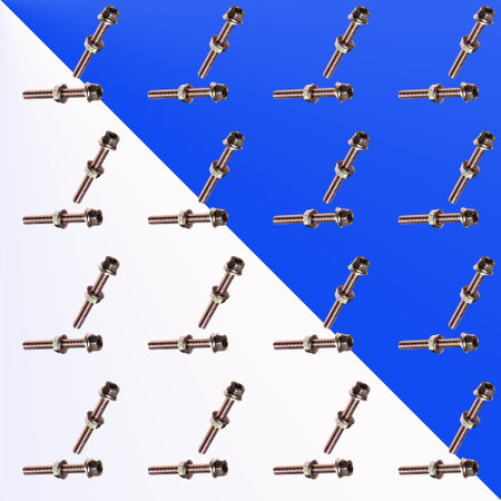 Bolt and nut, washer on a blue white background. seamless pattern, close-up, wallpaper, texture,...