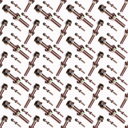 Bolt and nut, washer on a white background. seamless pattern, close-up, wallpaper, texture, copy space for textの写真素材