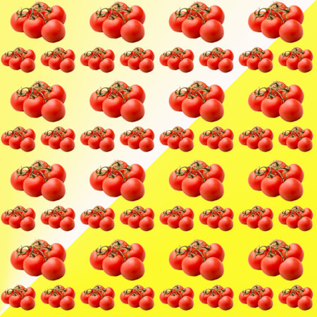 Tomatoes on a branch on a yellow and white gradient background, seamless pattern, flat layout, template, advertising, banner, top viewの写真素材