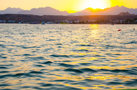 Seashore with hotels at sunsetのeditorial素材