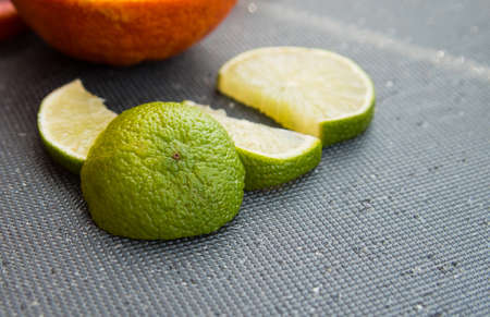 Lime slices red orange, close-up, copy space, template, postcard, background,の写真素材