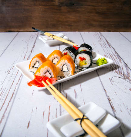 Sushi, rolls on a white plate close-up, copy space, templateの写真素材