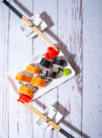 Sushi, rolls on a white plate close-up, copy space, templateの写真素材