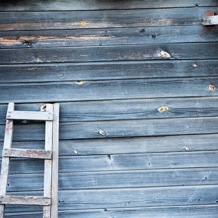 Wooden shield painted in light blue color, background, texture, copy spaceの写真素材
