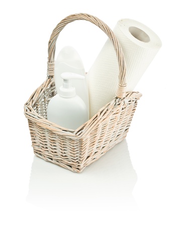 basket with bottles and paper towelの写真素材
