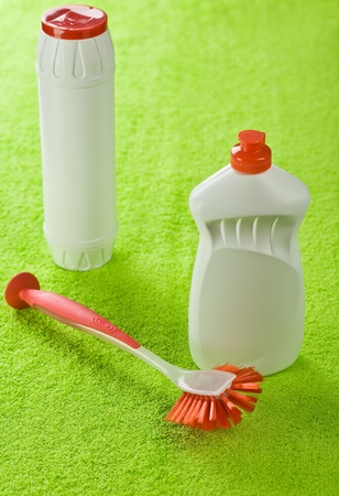 bottles and brash on green towelの写真素材