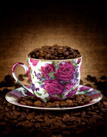 coffee cup on a grains of coffeeの写真素材