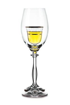 empty and full wineglassの写真素材