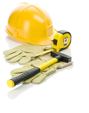 gloves with hammer and helmetの写真素材