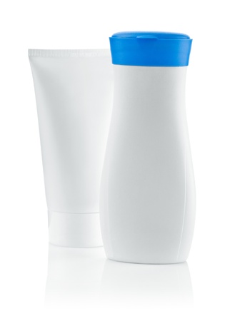 isolated bottle with blue lid and white tubeの写真素材