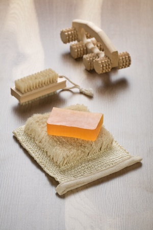 massager hairbrush and soap on bastの写真素材