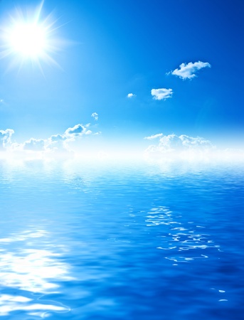blue water and sky with sunの写真素材