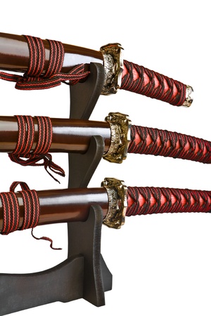 close up isolated on white swords of samuraiの写真素材