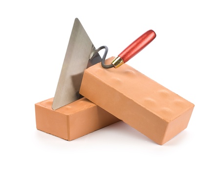 orange bricks with trowel
