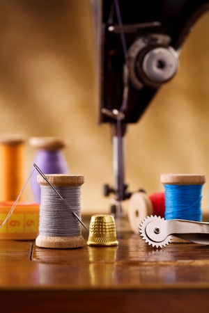small sewing wooden bobbin with other items