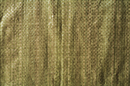 Green wickerwork texture close upの写真素材