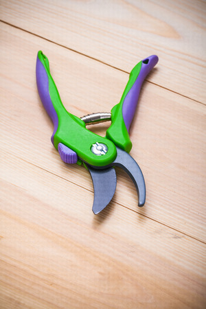 gardening tools - secateurs on wooden boardsの写真素材