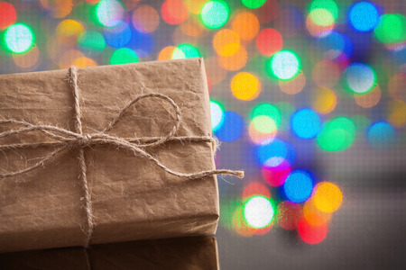 very close up view on brown vintage paper gift box on miror surfaceの写真素材