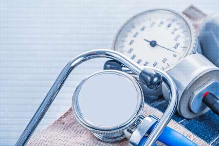 stethoscope blood pressure monitor on blue background medicalの写真素材