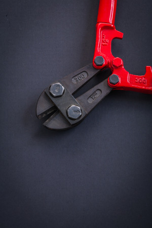 opened vertical version streel cutter very close up aerial viewの写真素材