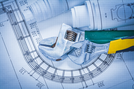 Adjustable spanners and construction blueprints maintenance concの写真素材
