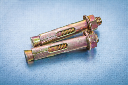 Anchor bolts for concrete walls on metallic background repairingの写真素材