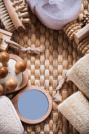 Composition of refreshment skincare items on wicker background sauna conceptの写真素材