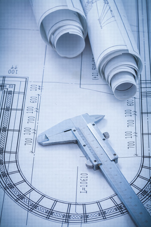 Construction plans metal vernier caliper on blueprint architecture and building concept.の写真素材