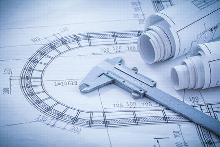Construction plans vernier caliper on blueprint horizontal version architecture and building concept.の写真素材