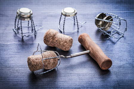 corkscrew and cocks of champagne with wires.の写真素材
