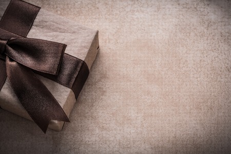 Gift box with bow paper on vintage background holiday concept.の写真素材