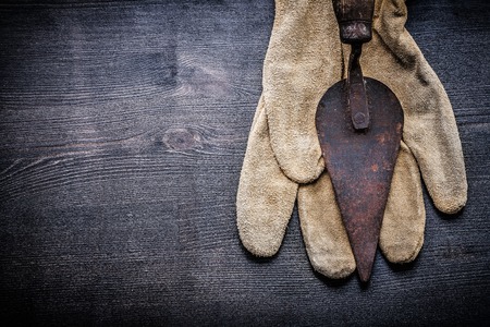 copyspace vintage tools putty spattle on glove.の写真素材