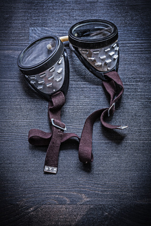 working goggles on vintage board.の写真素材