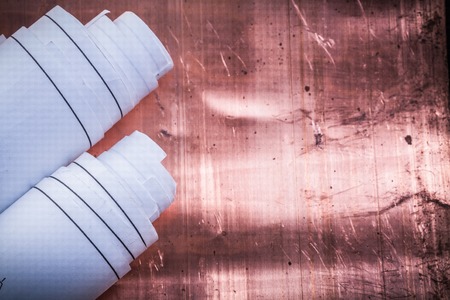 Blueprints on coppery background construction concept.の写真素材