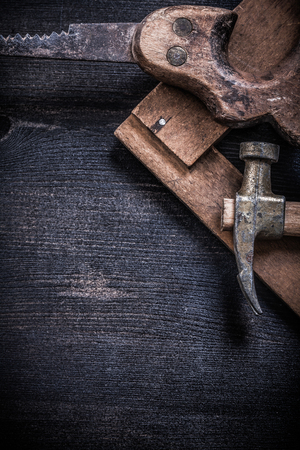 Vintage messy tools on wooden board construction concept.の写真素材