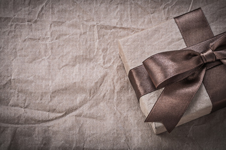 Present box on wrapping paper holidays concept.の写真素材