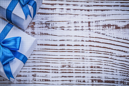 Giftboxes on vintage wooden board copy space holidays concept.の写真素材