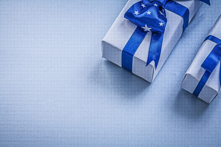 Assortment of gift boxes on blue background holidays concept.の写真素材