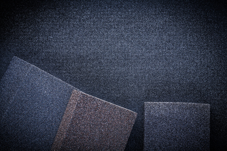 Abrasive sponges on sandpaper.の写真素材