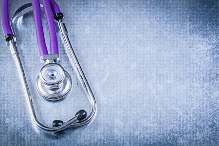 Auscultoscope on metallic background top view medicine concept.の写真素材