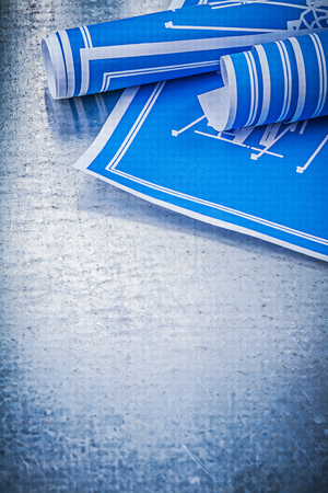 Set of blue engineering drawings on metallic background construction concept.の写真素材