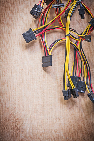 Electric wires on wooden board electricity concept.