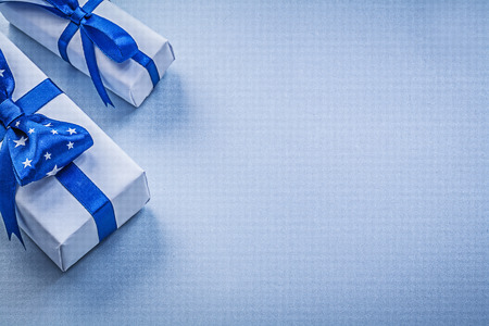 Composition of gift boxes on blue background holidays concept.の写真素材