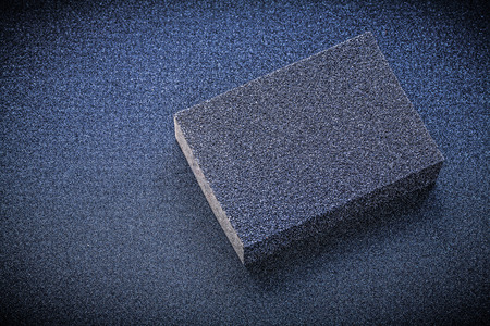 Abrasive sponge on glass- paper.の写真素材