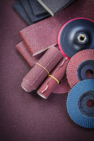 Collection of abrasive materials on polishing paper top view.の写真素材
