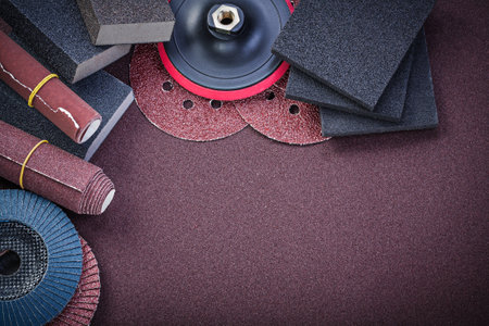 Set of abrasive materials on polishing sheet horizontal view.の写真素材