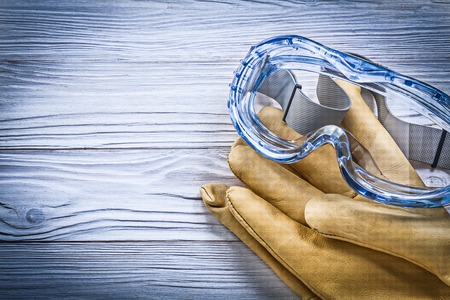 Set of protective workwear on wooden board construction concept.の写真素材