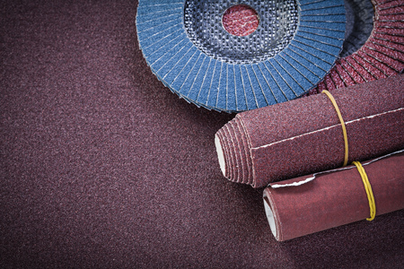 Glass-paper abrasive flap wheels on polishing sheet.の写真素材