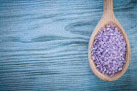 Lavender mineral sea salt in wooden spoon on wood board healthcare concept.の写真素材